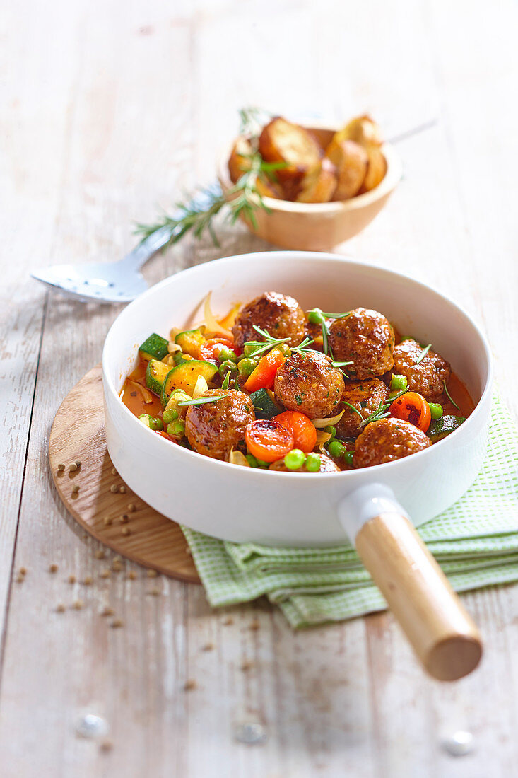 Meatballs with herbs and spring vegetables