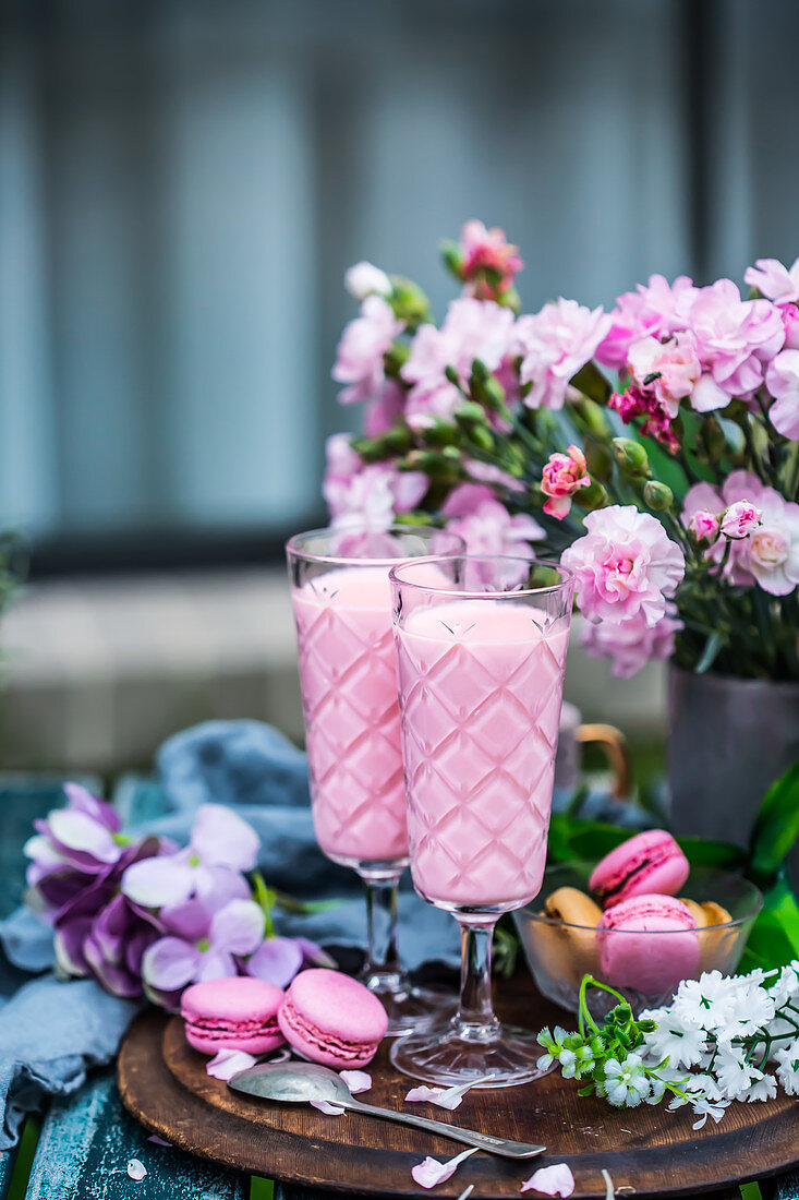 Rose lassi served with macarons