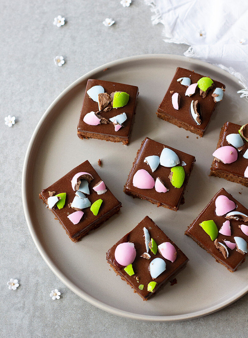 Easter brownies with chocolate ganache and coloured chocolate eggs