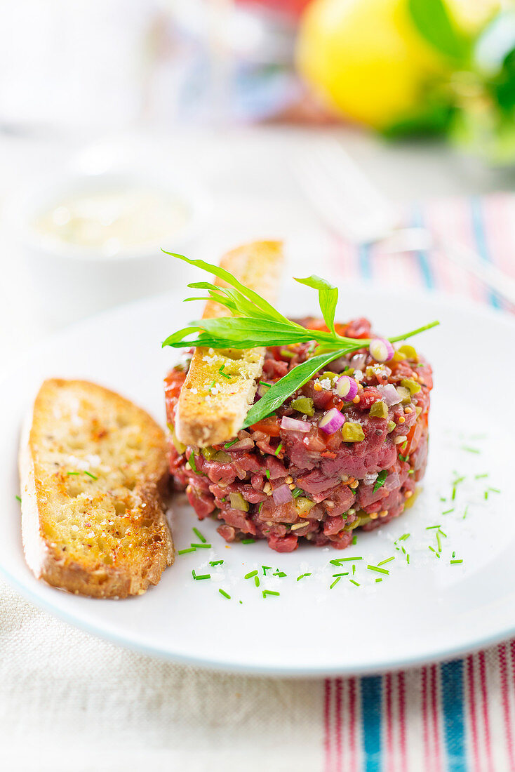 Beef tartar served with toasted bread