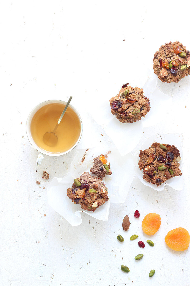 Muffins with dried fruits, almonds and pistachios