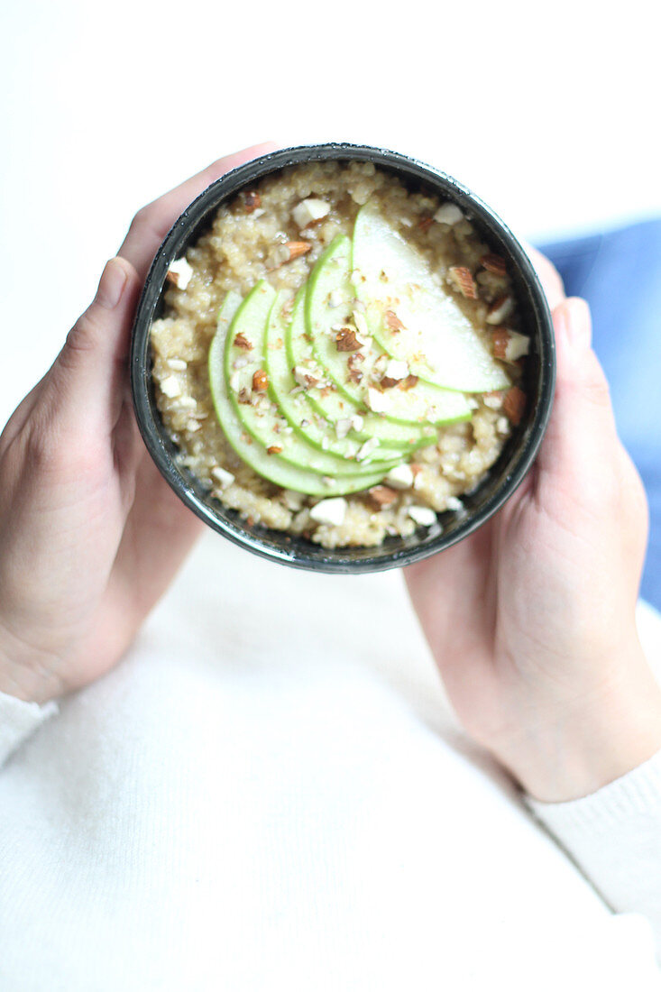 Porridge with green apples and hazelnuts