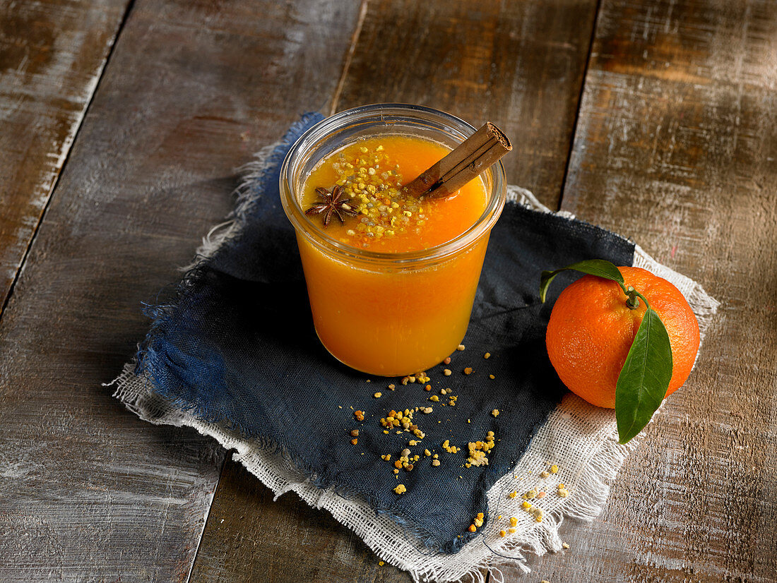 Tangerine juice with cinnamon and flower pollen