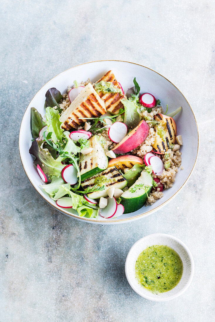 Quinoa salad with grilled nectarines, halloumi and courgettes