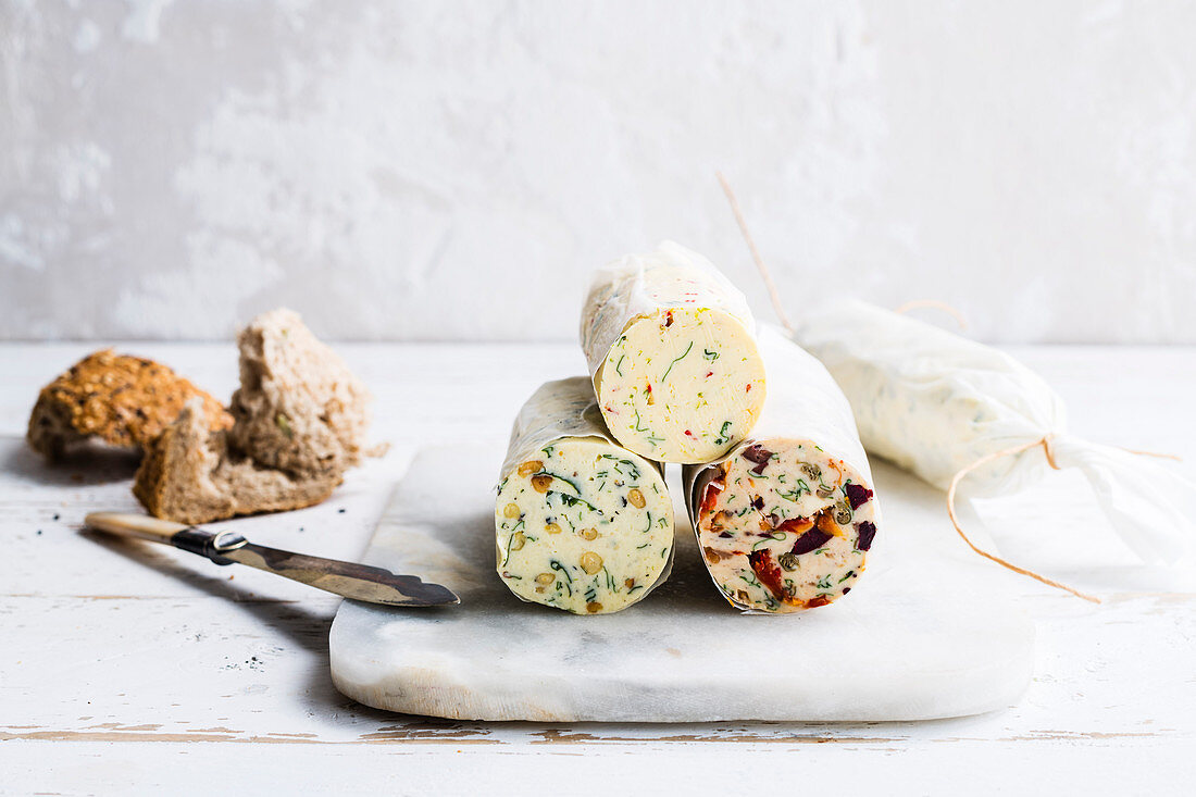 Three different flavoured roll butters