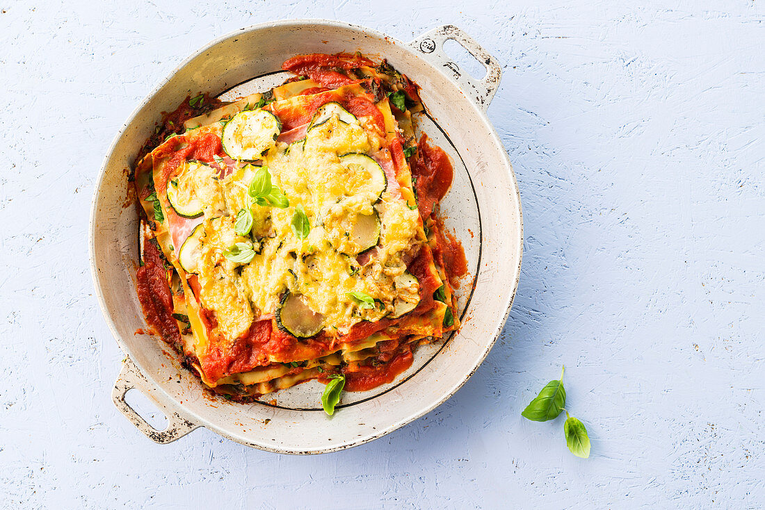 Lasagne with ham, ricotta, spinach and courgette