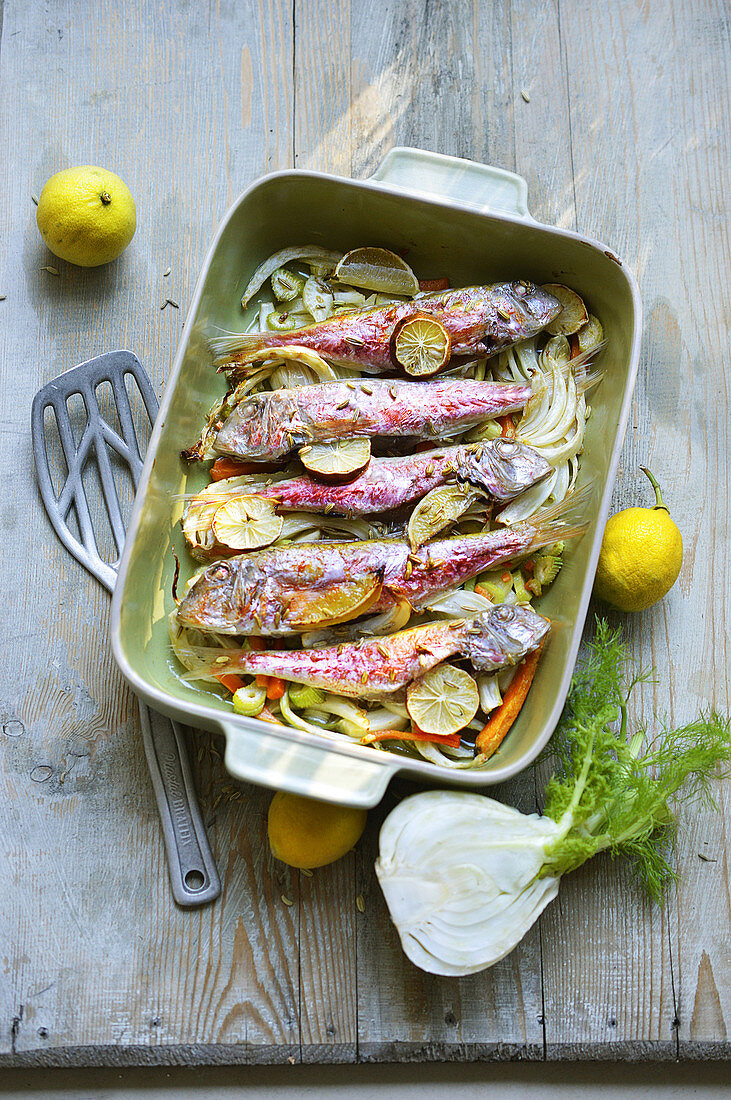 Oven baked red mullet with lemon, fennel and carrot