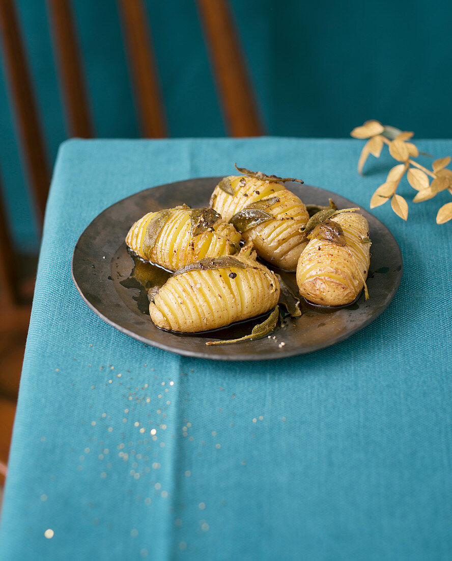 Hassleback potatoes with sage as a Christmas side dish