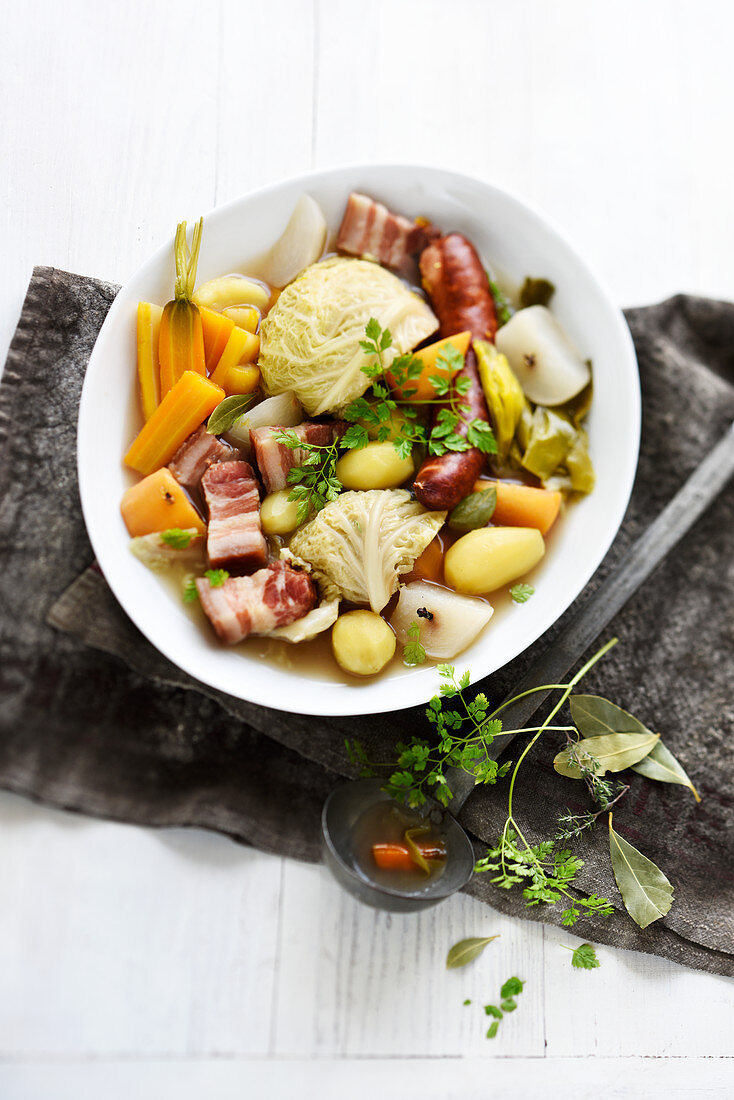 Hearty stew with white cabbage, sausages and potatoes