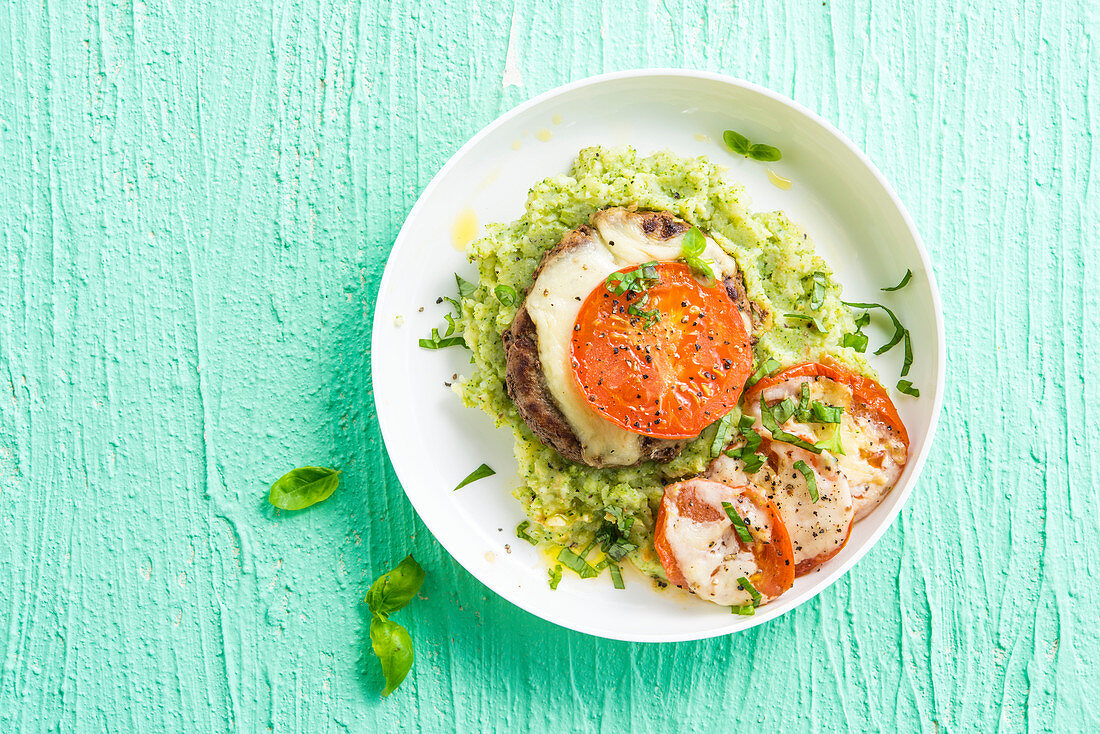 Caprese hamburger on broccoli puree