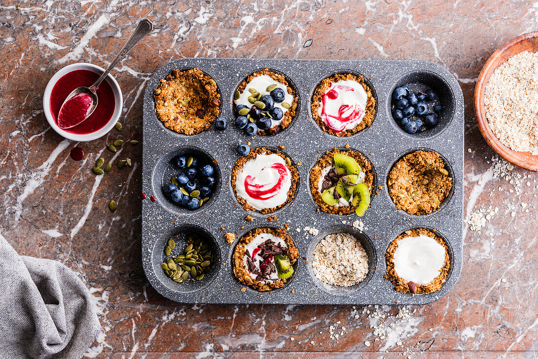 Cupcakes with fruit in a muffin tin