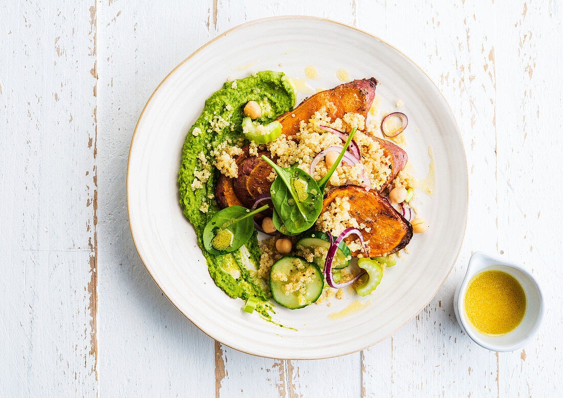 Sweet potatoes with quinoa and spinach hummus