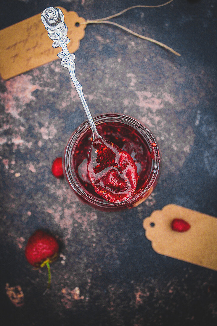 Homemade jam with wild strawberries and raspberries