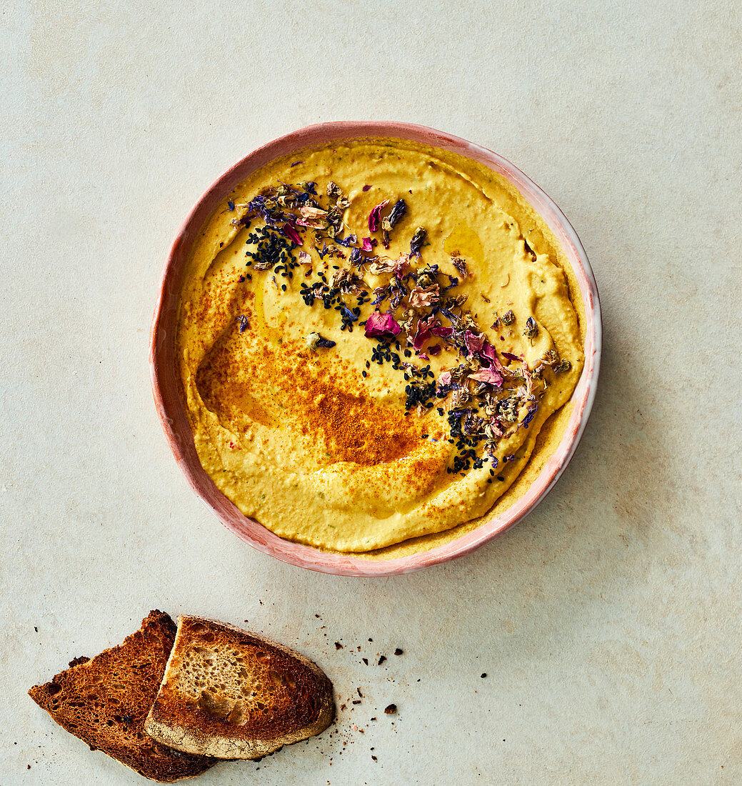 Coral lentil dip served with toasted bread