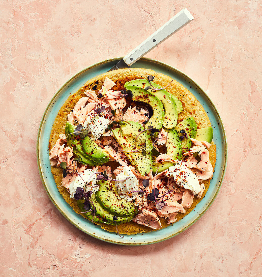 Chickpea flour galette with salmon, avocado and ricotta cheese