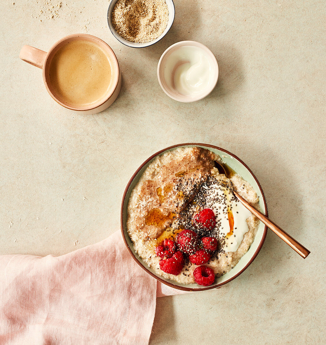 Breakfast porridge with oat bran and raspberries