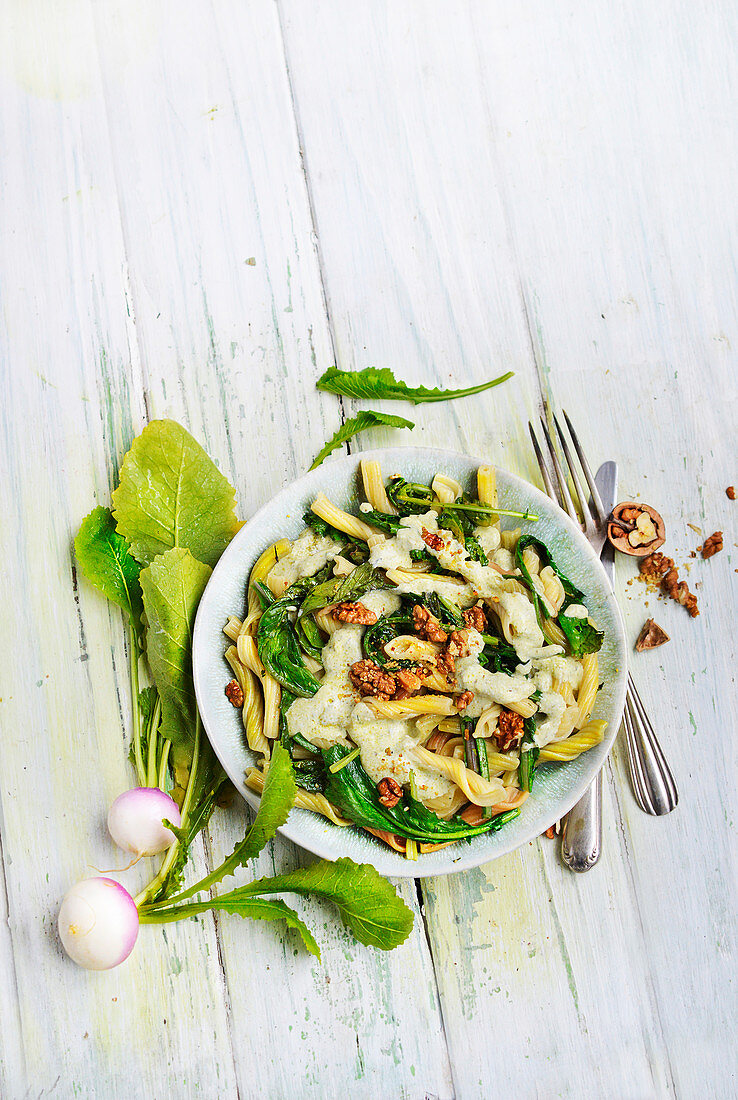 Pasta with ricotta and beetroot leaves and nuts