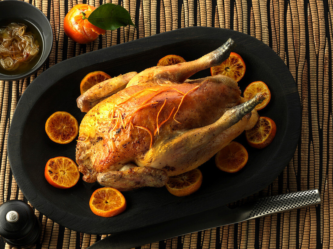 Capon with tangerines