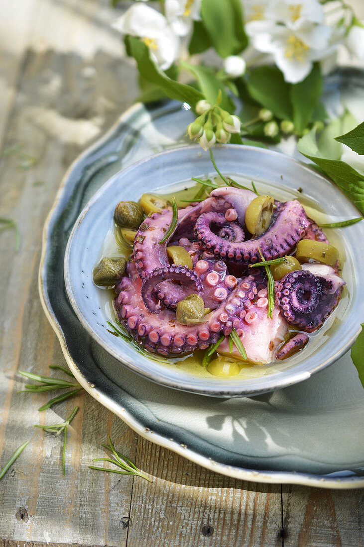 Marinated squid with capers and olives