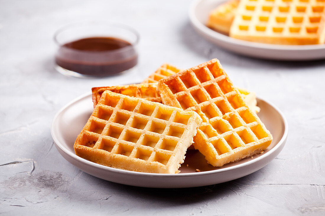 Plate of a bunch of homemade waffles