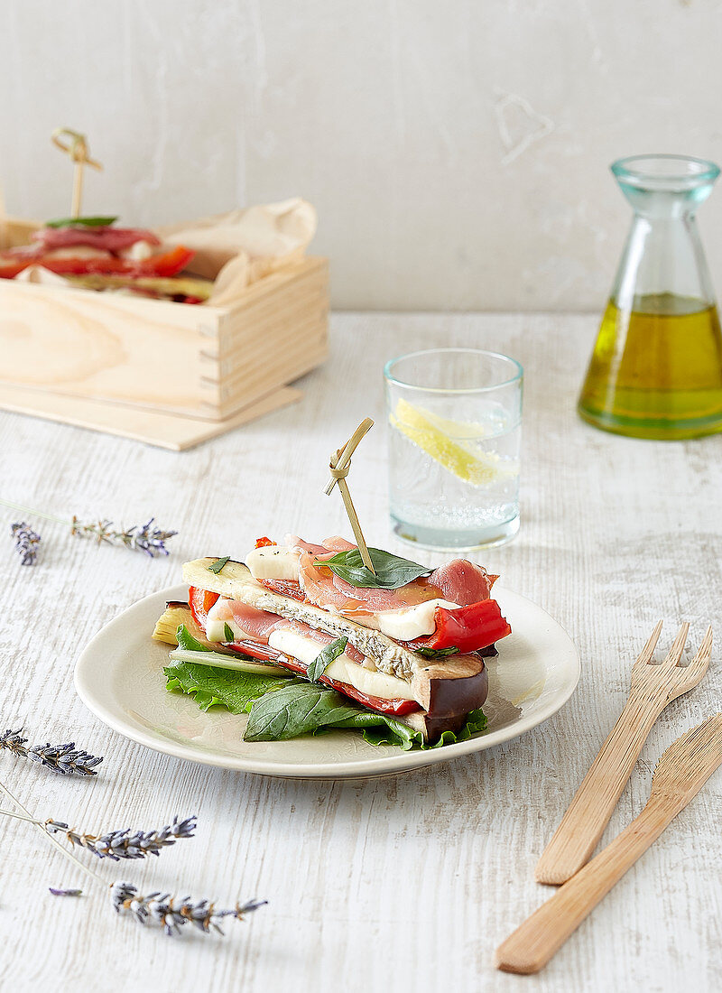 Summer vegetable towers with mozzarella and ham