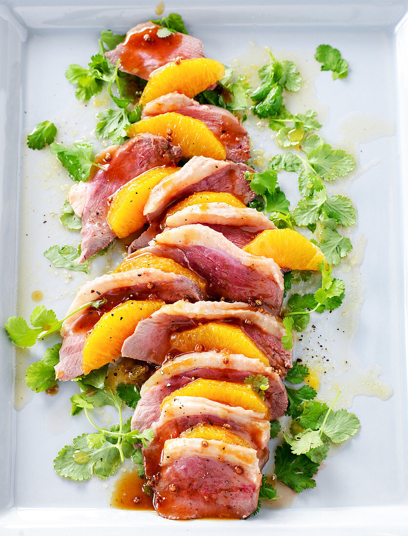 Steamed duck breast with oranges and coriander