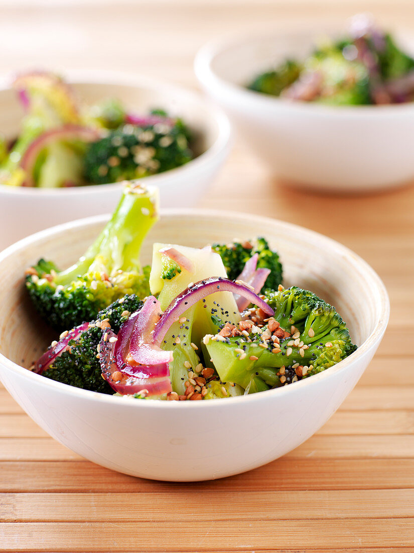 Warm broccoli salad with grains and red onions