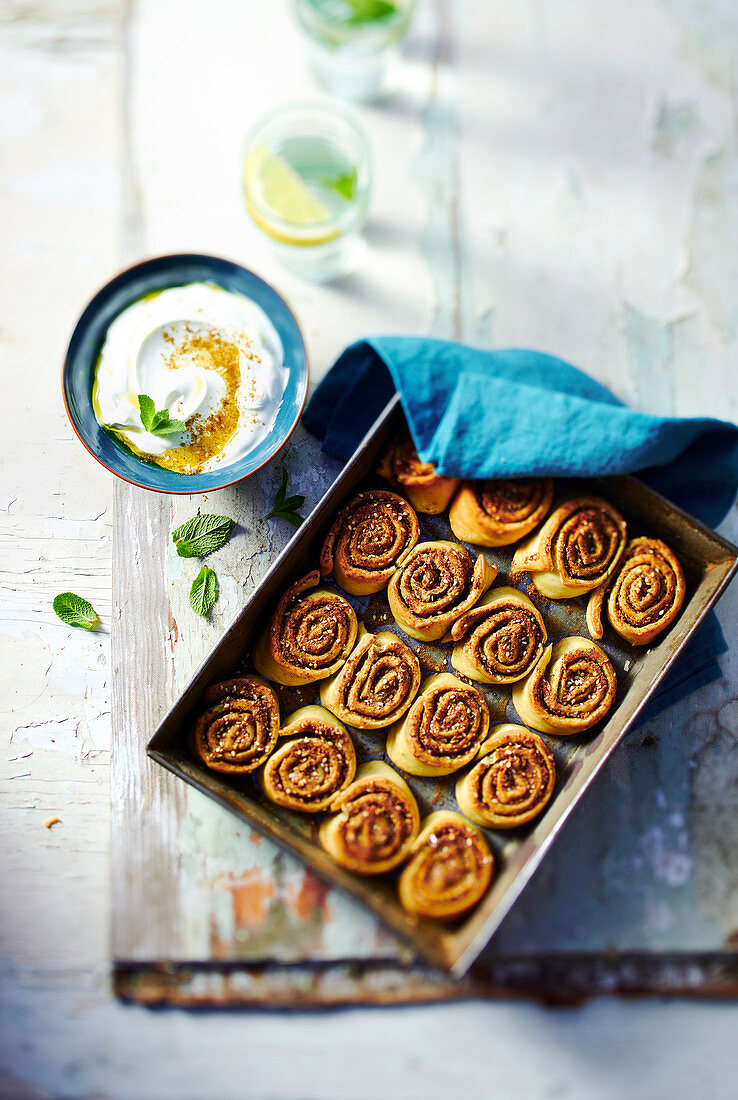 Spicy pastry snails with zatar and yoghurt dip