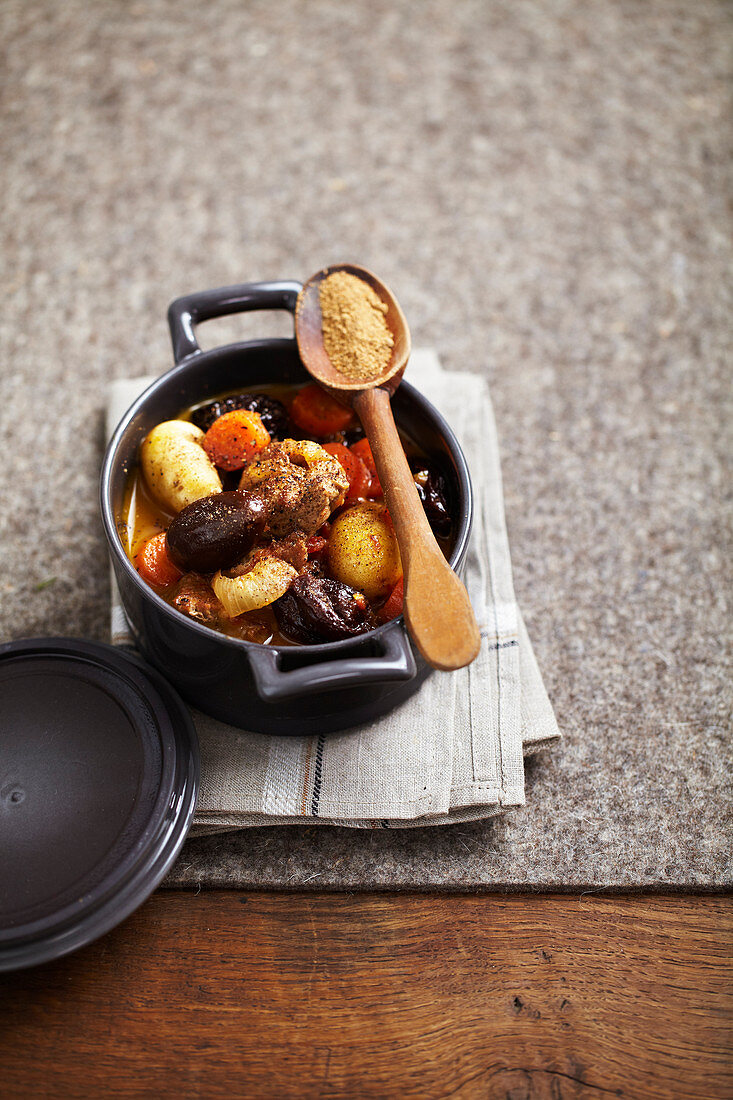 Lamb cocotte with dates and plums