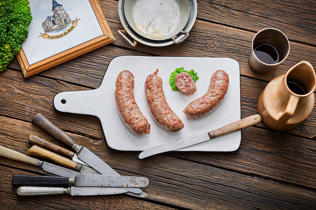 Cooked sausages on a cutting board