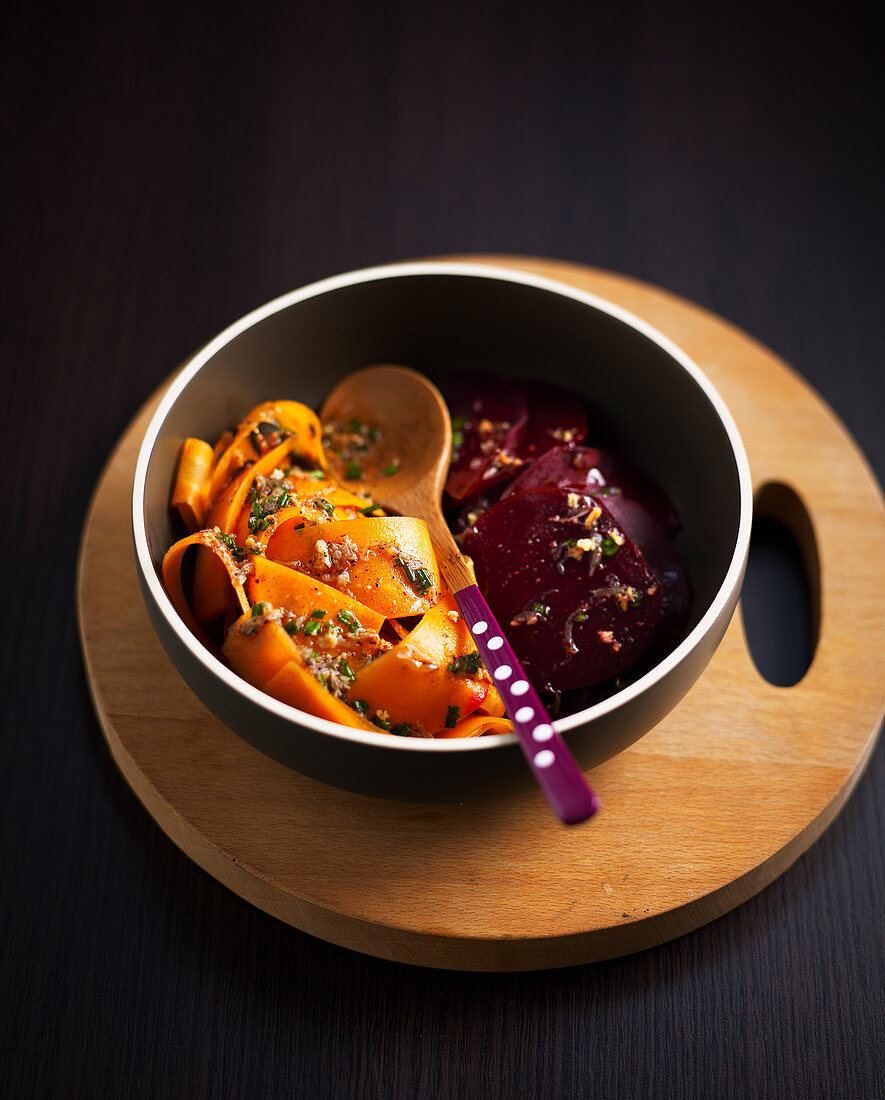 Vegetable salad with steamed carrots, beetroot and spices