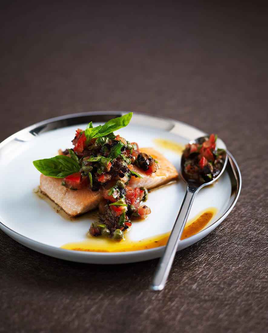 Grilled salmon steak with sauce vierge