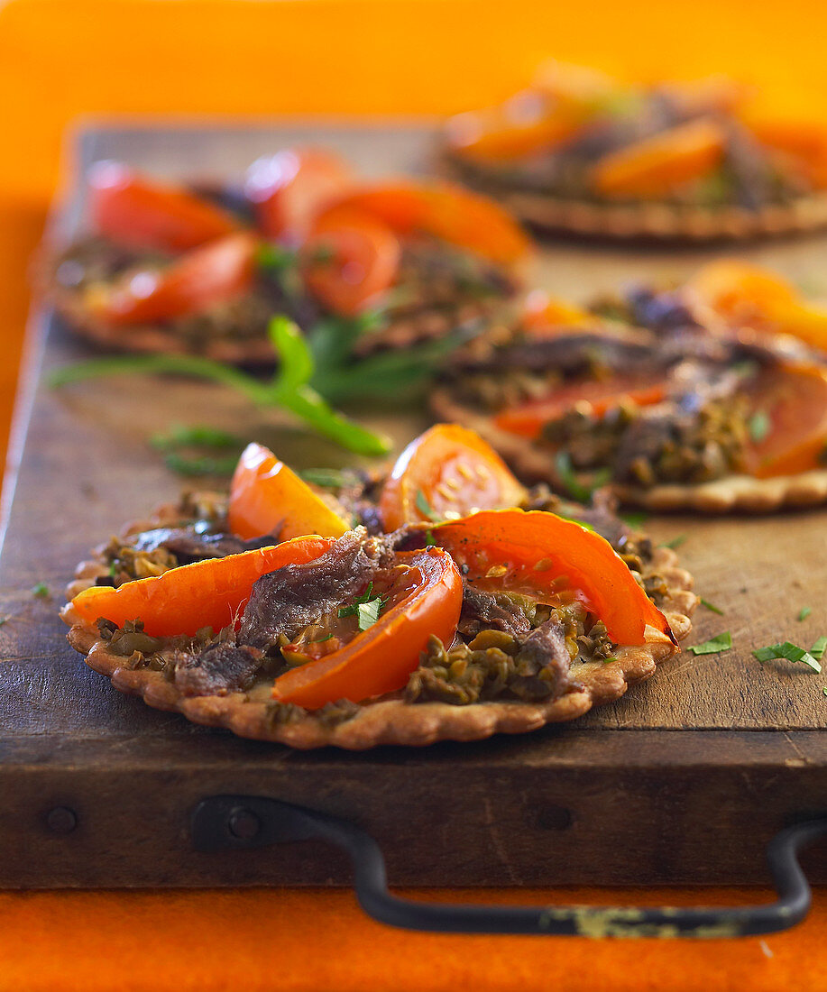 Small tomato and anchovy pizza