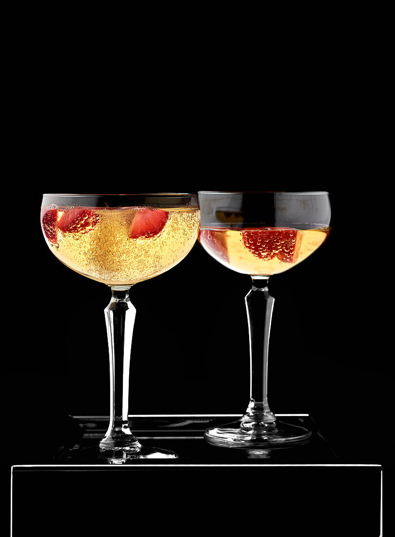 Champagne in glasses with strawberries