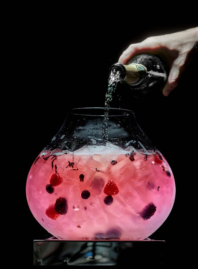 Cocktail of champagne soup with red fruits