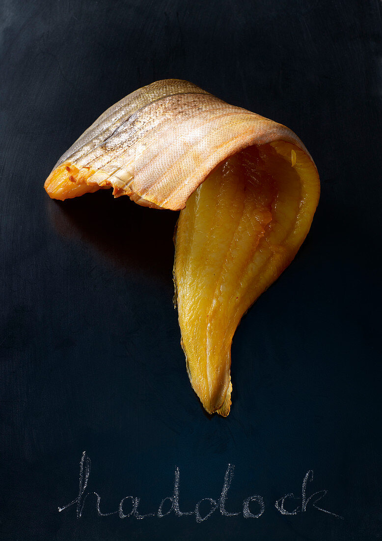 Haddock fillet against a dark background