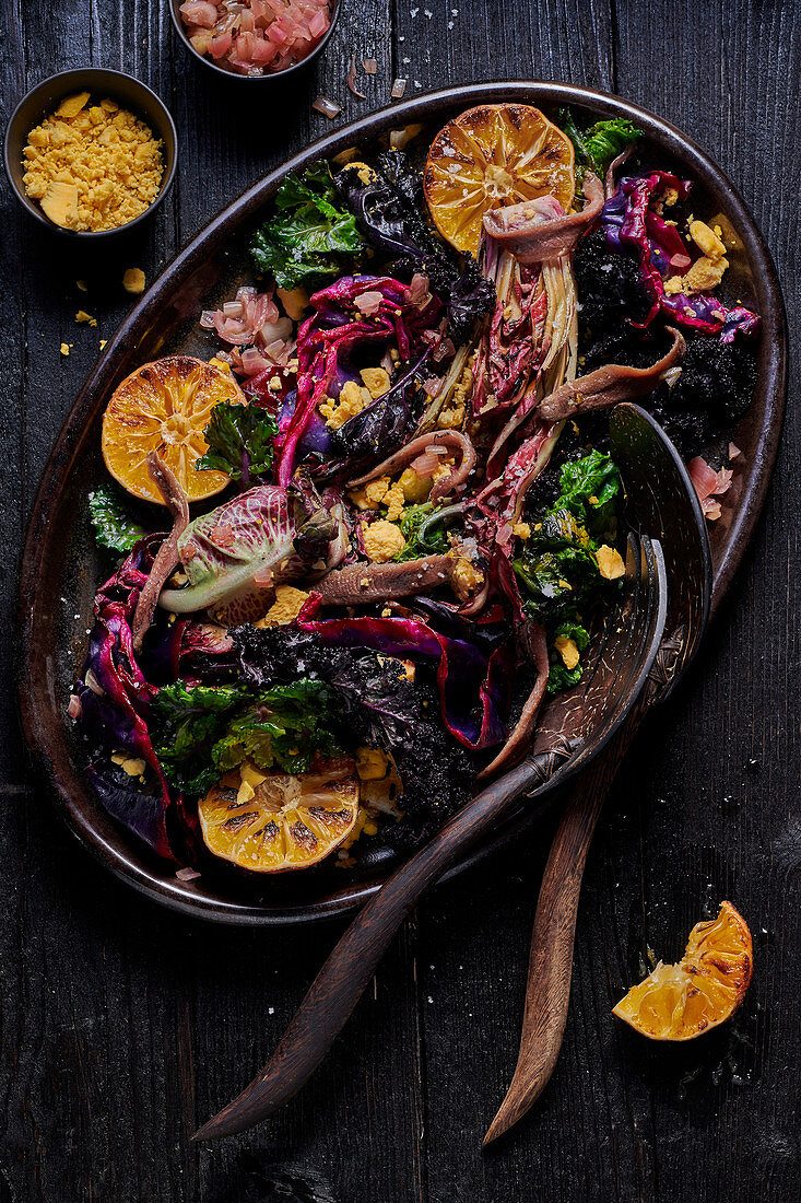 Dish of roasted vegetables with anchovies