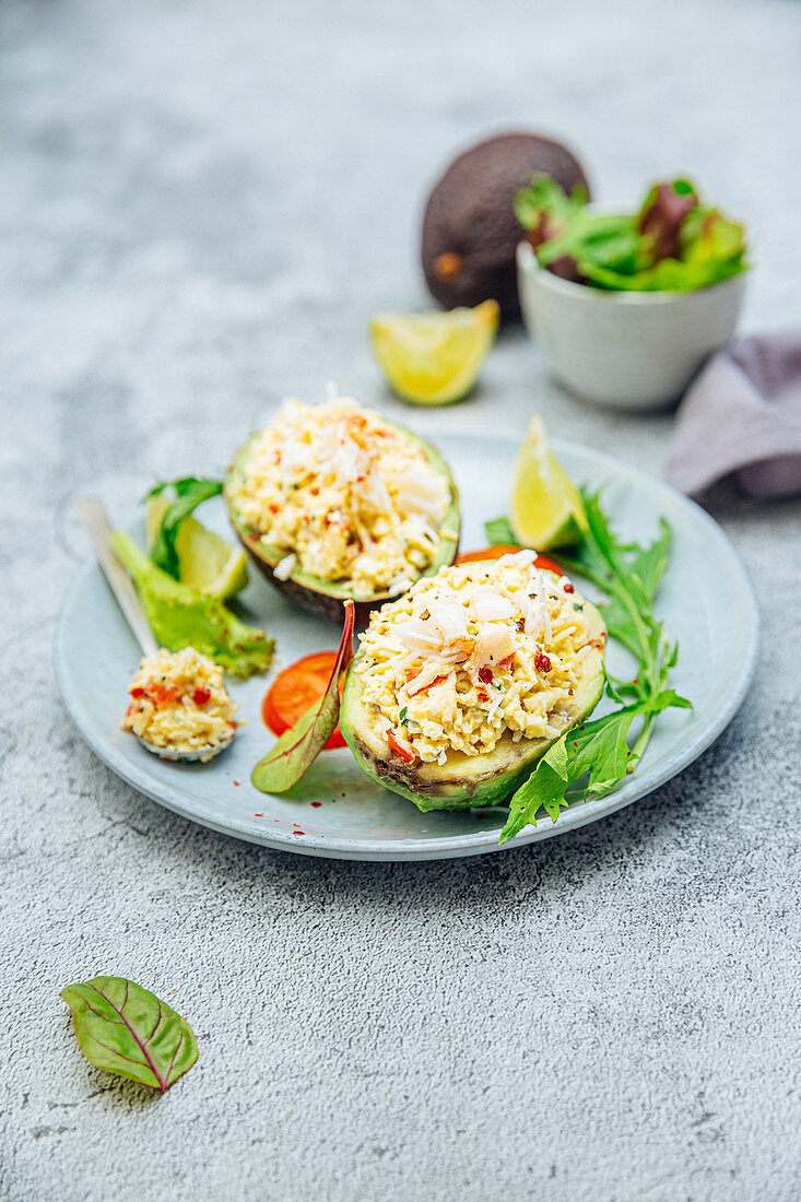 Avocado stuffed with crab,egg and tomato