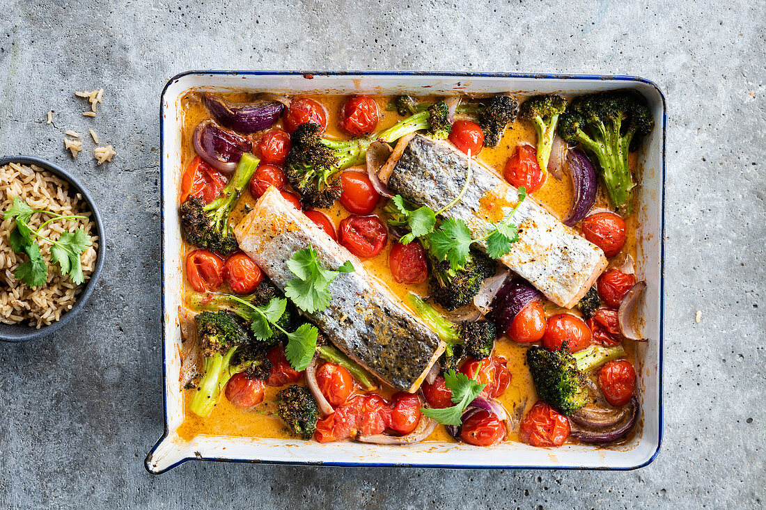 Baked salmon steak and roasted vegetables