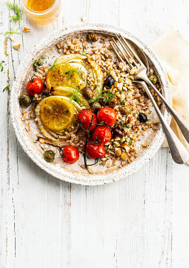 Baked wheat and fennel, olives, lemon and cherry tomatoes