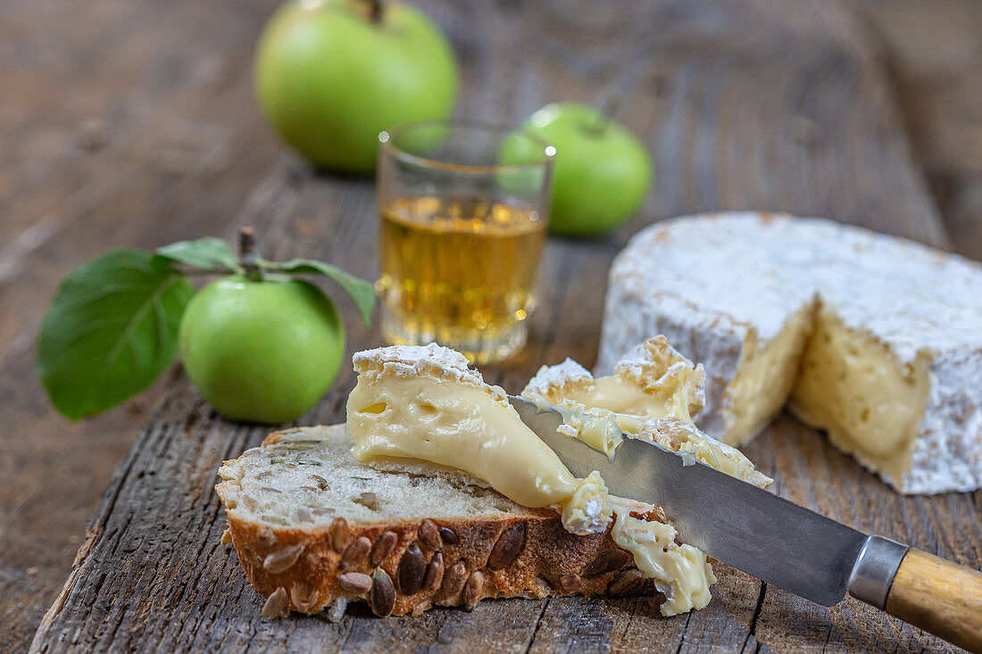 Camembert and a glass of cider