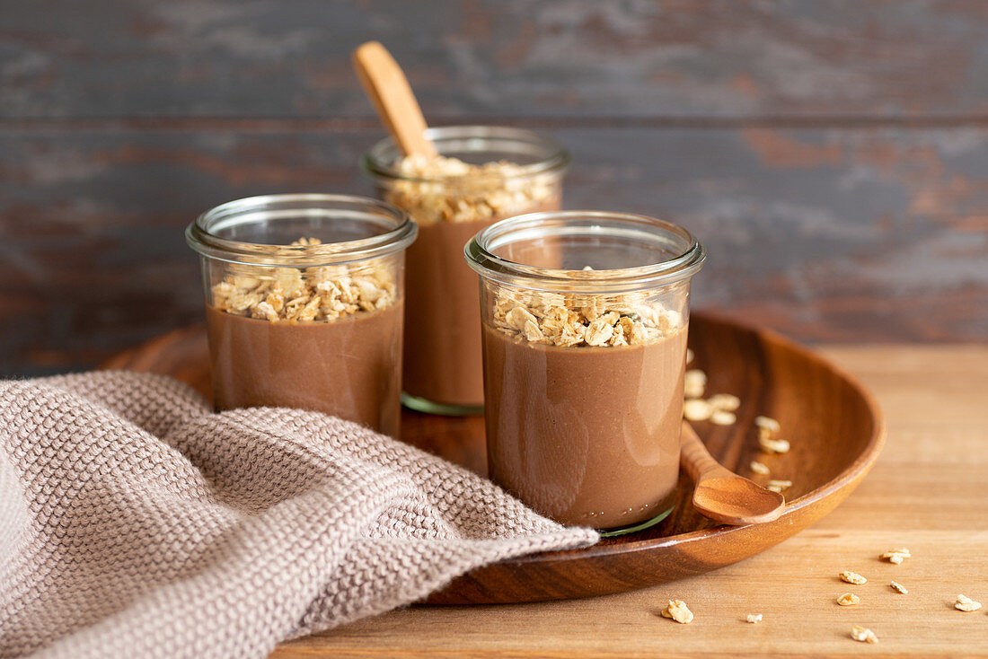 Chocolate cream dessert topped with cereals