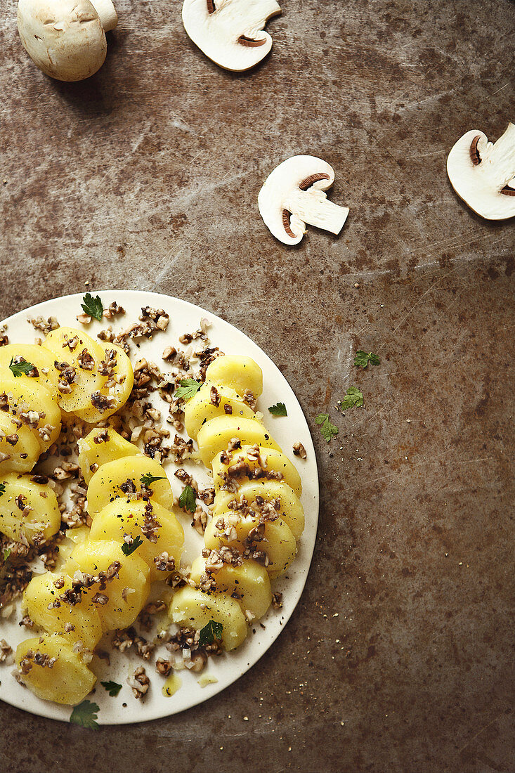 Potatoes with thinly chopped mushrooms