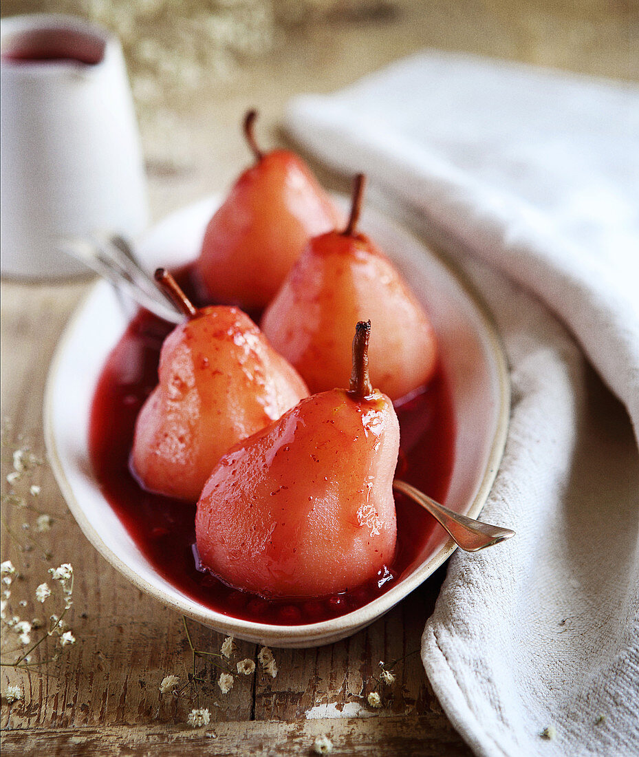 Poached pears with cranberries