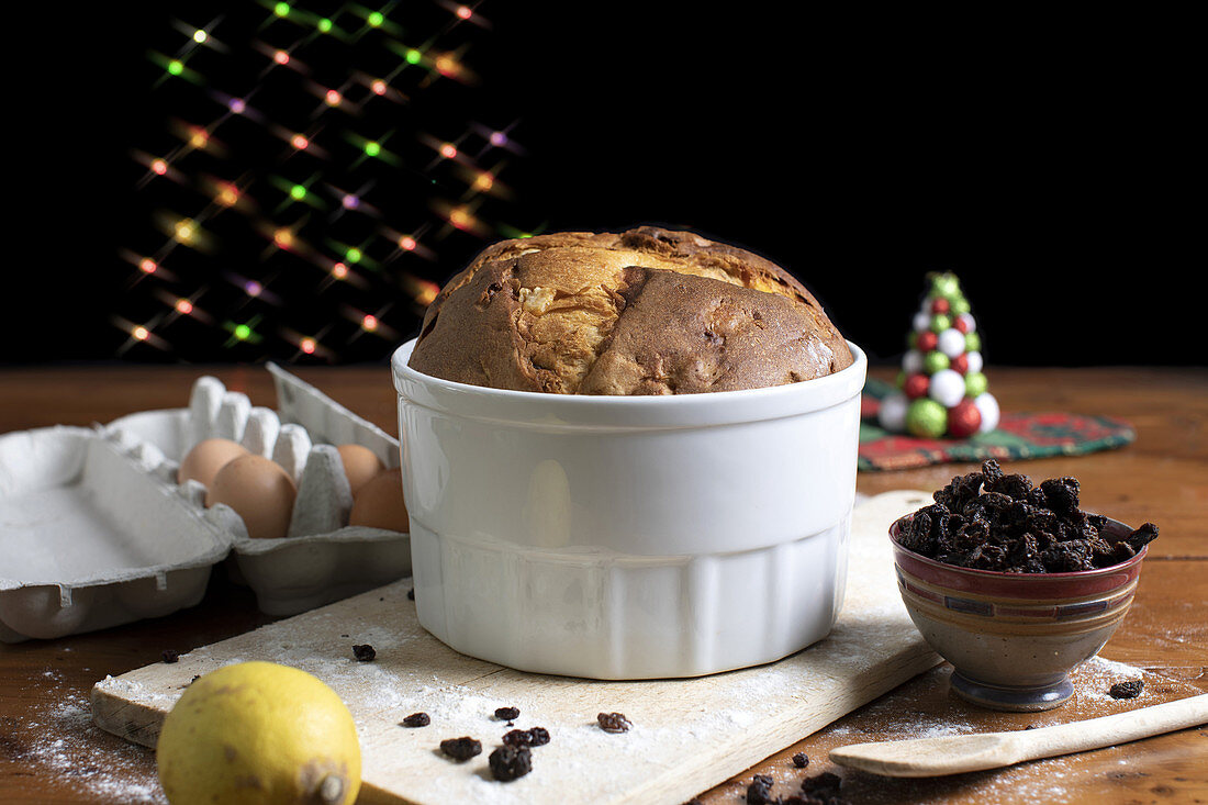 Traditional italian panettone with Christmas decorations.