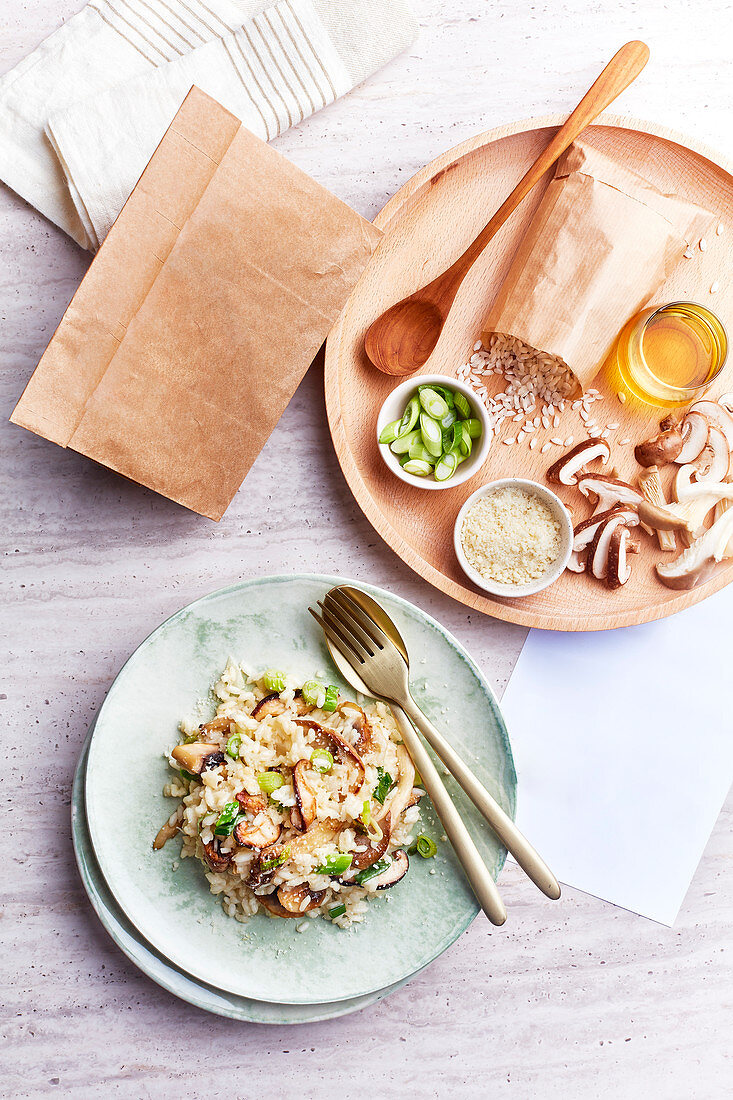 Mushroom risotto and its tray of ingredients