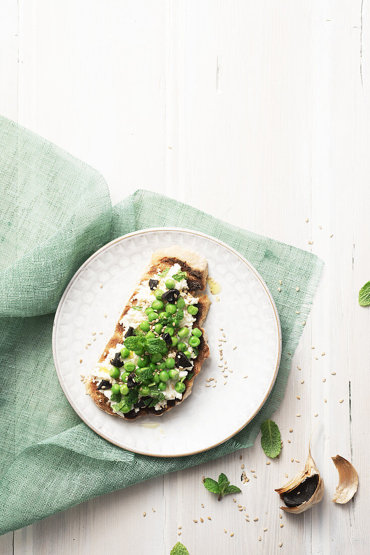 Cream cheese,pea and mint spring toast appetizer