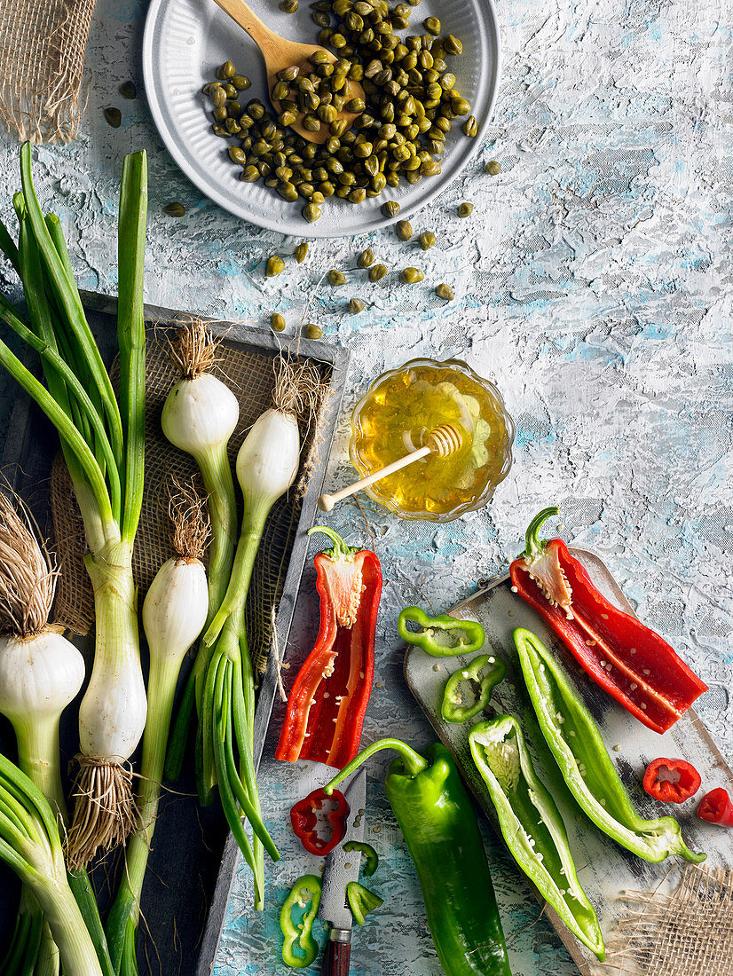 Composition with spring onions,peppers and capers