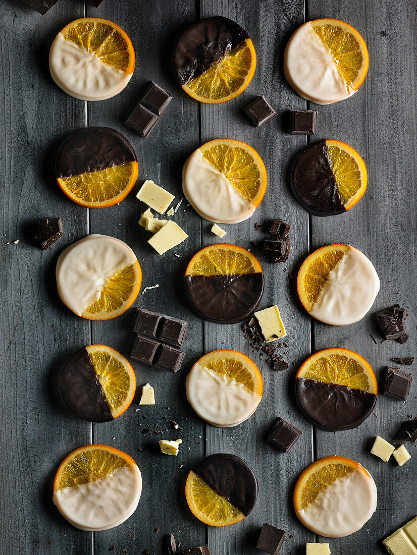Confit lemon slices dipped in white and dark chocolate