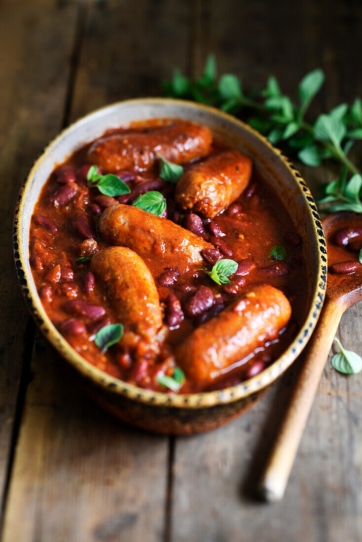Stewed red beans with chorizo and tomato sauce